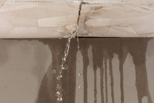 Professional Flood Damage Cleanup technician working in Mansfield, PA
